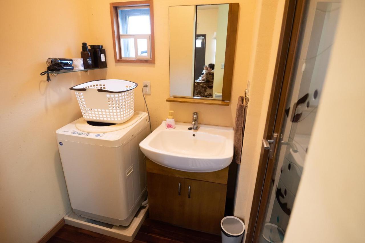 Ferienwohnung コテージなかどまり Onna Exterior foto