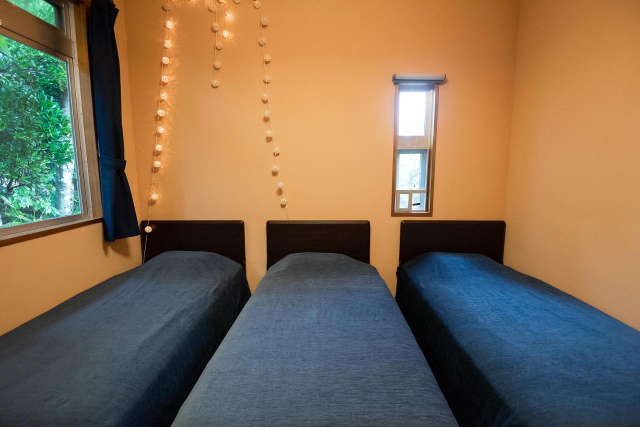 Ferienwohnung コテージなかどまり Onna Exterior foto